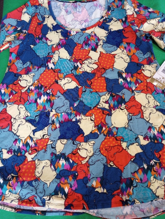 LuLaRoe Tops - LuLaRoe Disney Oogie Boogie Pastel  Print Top - Pink, Blue, Cream